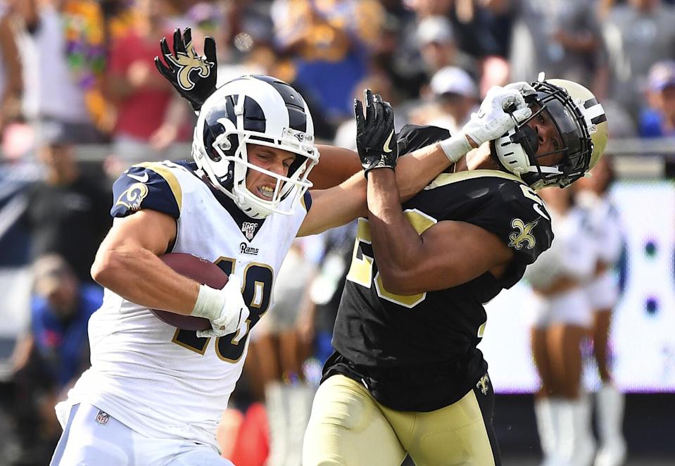 Cooper Kupp stiff-arms Saints cornerback Marshon Lattimore on a 66-yard reception in September 2019.