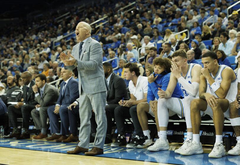 WESTWOOD, CA - DECEMBER 3, 2024: UCLA Bruins head coach Mick Cronin yells out an offensive play.