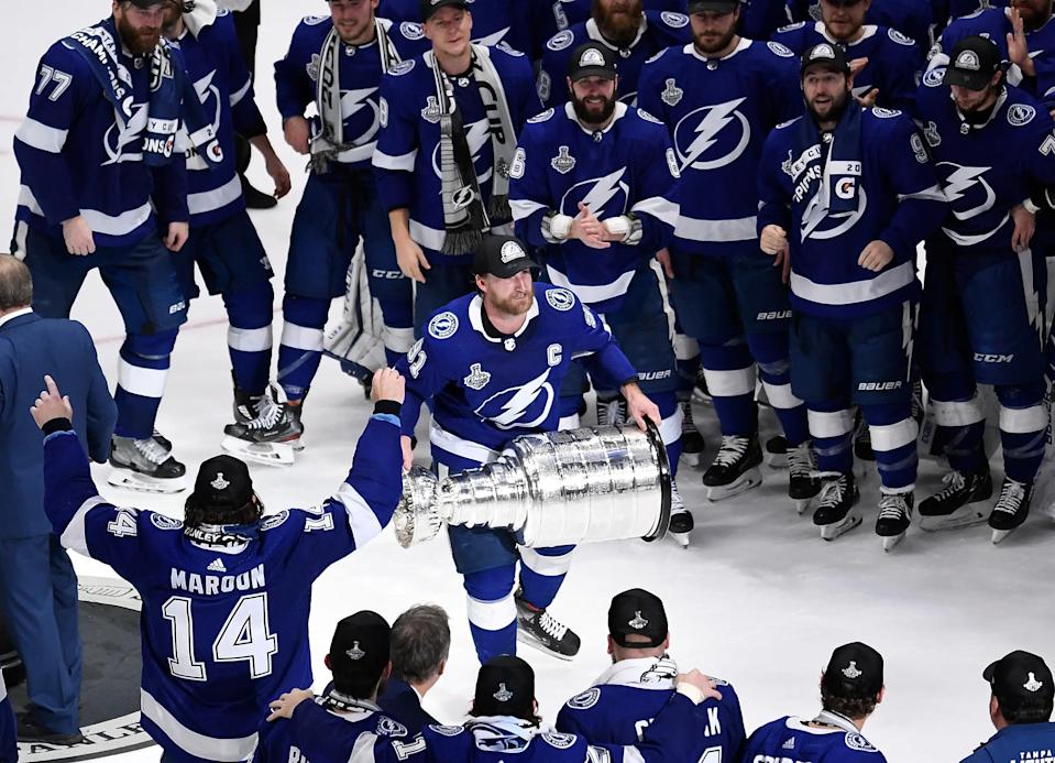 Steven Stamkos hoists the Stanley Cup after the Lightning defeated the Montreal Canadiens in game five to win the 2021 Stanley Cup Final