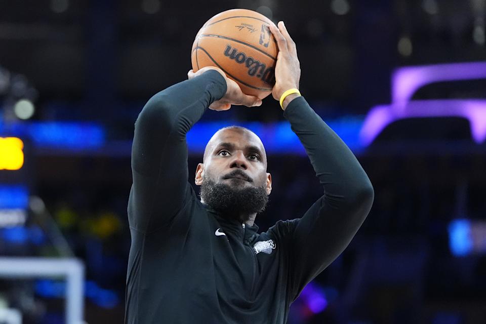 Los Angeles Lakers forward LeBron James warms up before an NBA basketball game against the New Orleans Pelicans, Tuesday, March 4, 2025, in Los Angeles. (AP Photo/Jae C. Hong)