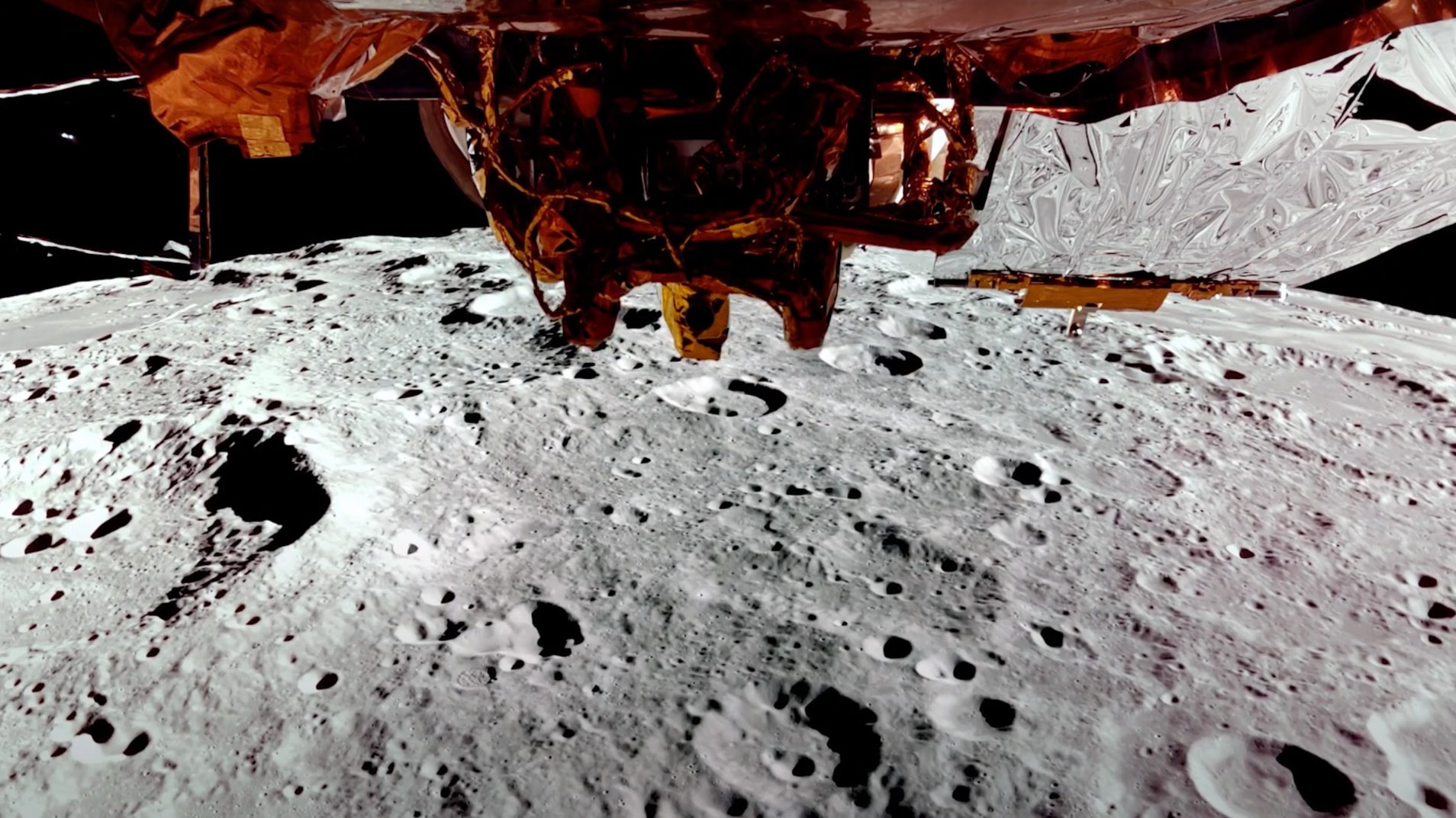 selfie taken by a moon-orbiting spacecraft, showing some of its golden hardware above the cratered gray lunar surface