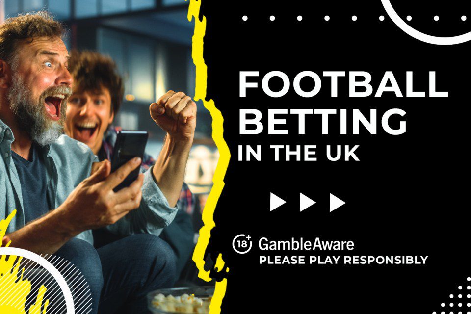 Two men excitedly watch a football game and bet on their phones.  Please play responsibly.